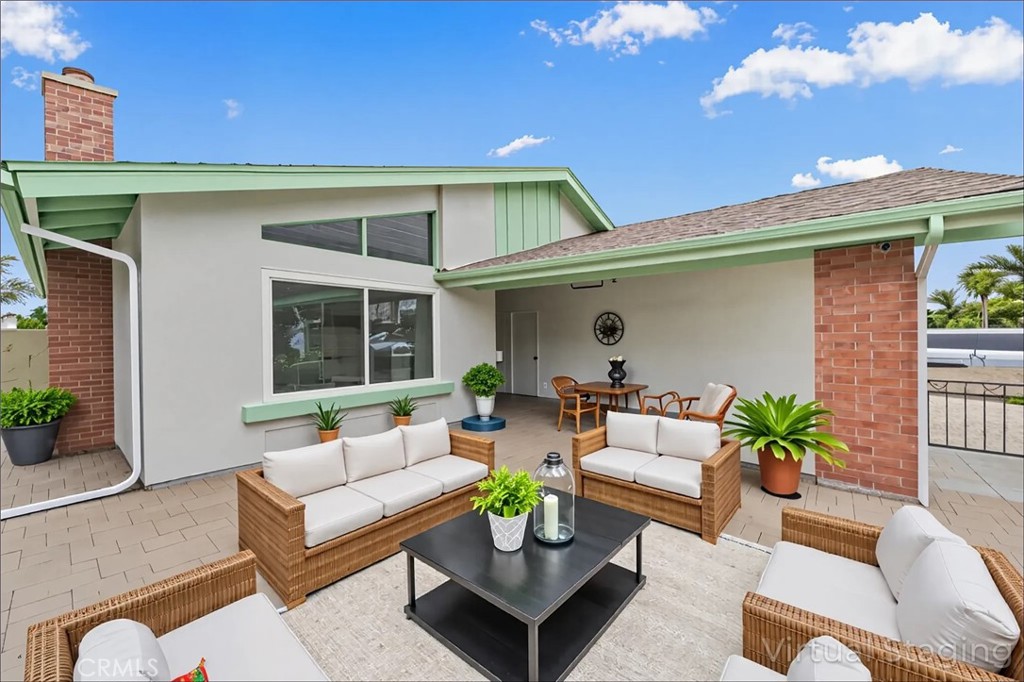 5161 Rotherham Circle Westminster, CA 92683 - Photo 20 of 24 a view of a patio with couches and potted plants