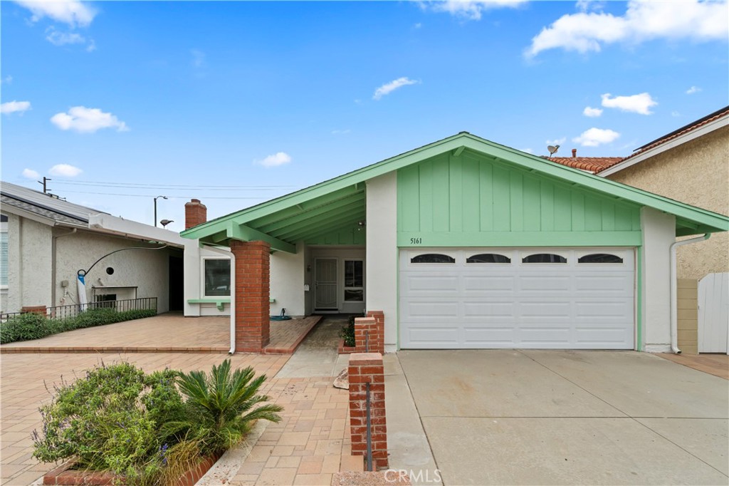 5161 Rotherham Circle Westminster, CA 92683 - Photo 23 of 24 a front view of a house with a garage