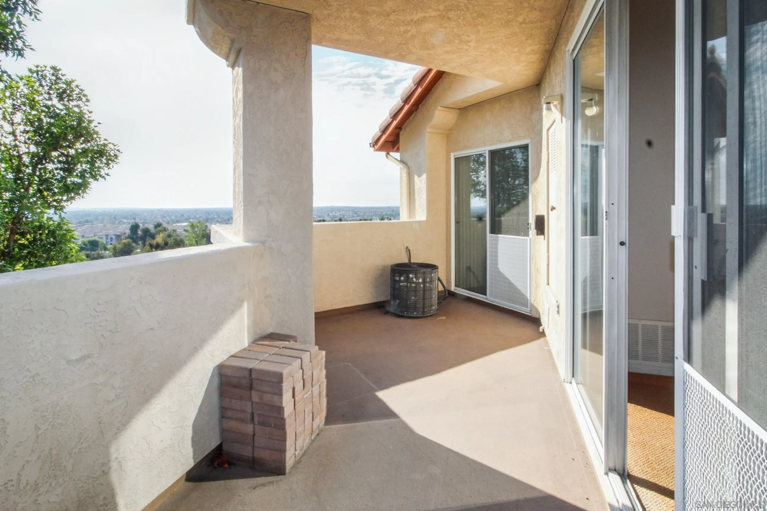 11175 Affinity Court, Unit 45 San Diego, CA 92131 - Photo 4 of 36 a view of balcony with couch