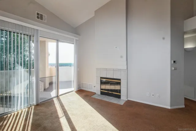 a view of bedroom with furniture and staircase