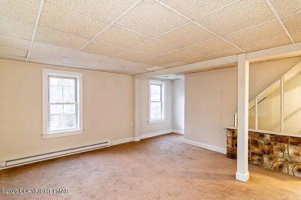 an empty room with windows