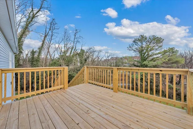 a view of a balcony with furniture