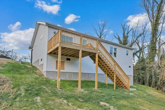 a front view of a house with yard