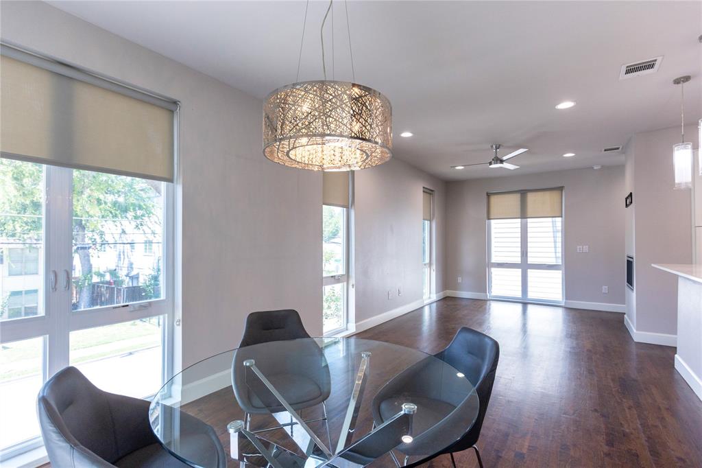 2016 North Fitzhugh Avenue, Unit 101 Dallas, TX 75204 - Photo 4 of 26 Dining area featuring recessed lighting, ceiling fan, dark wood-type flooring, and a chandelier