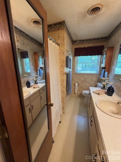 20415 Efird Road Albemarle, NC 28001 - Photo 13 of 16 a bathroom with a sink a mirror and a bathtub