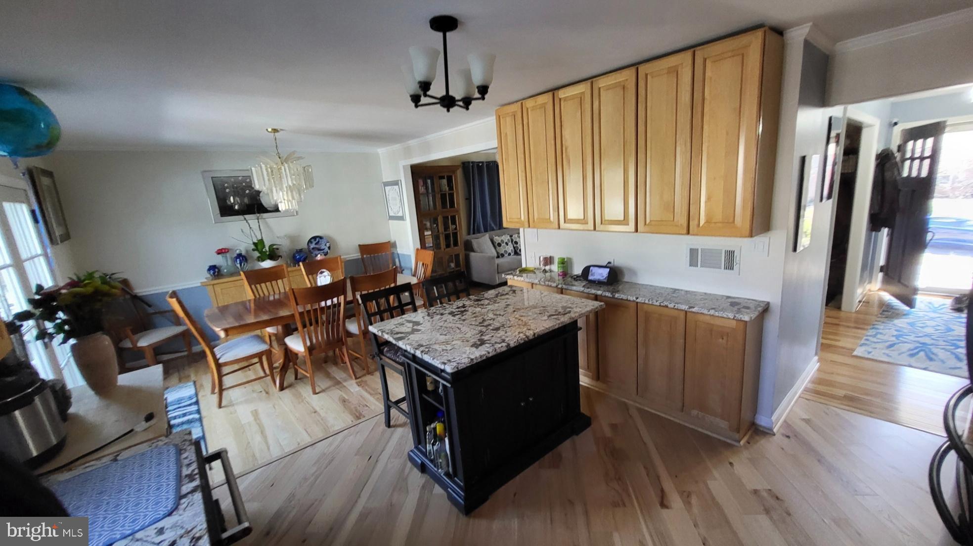8001 Postoak Road Potomac, MD 20854 - Photo 10 of 30 Modern kitchen with elegant dining area.