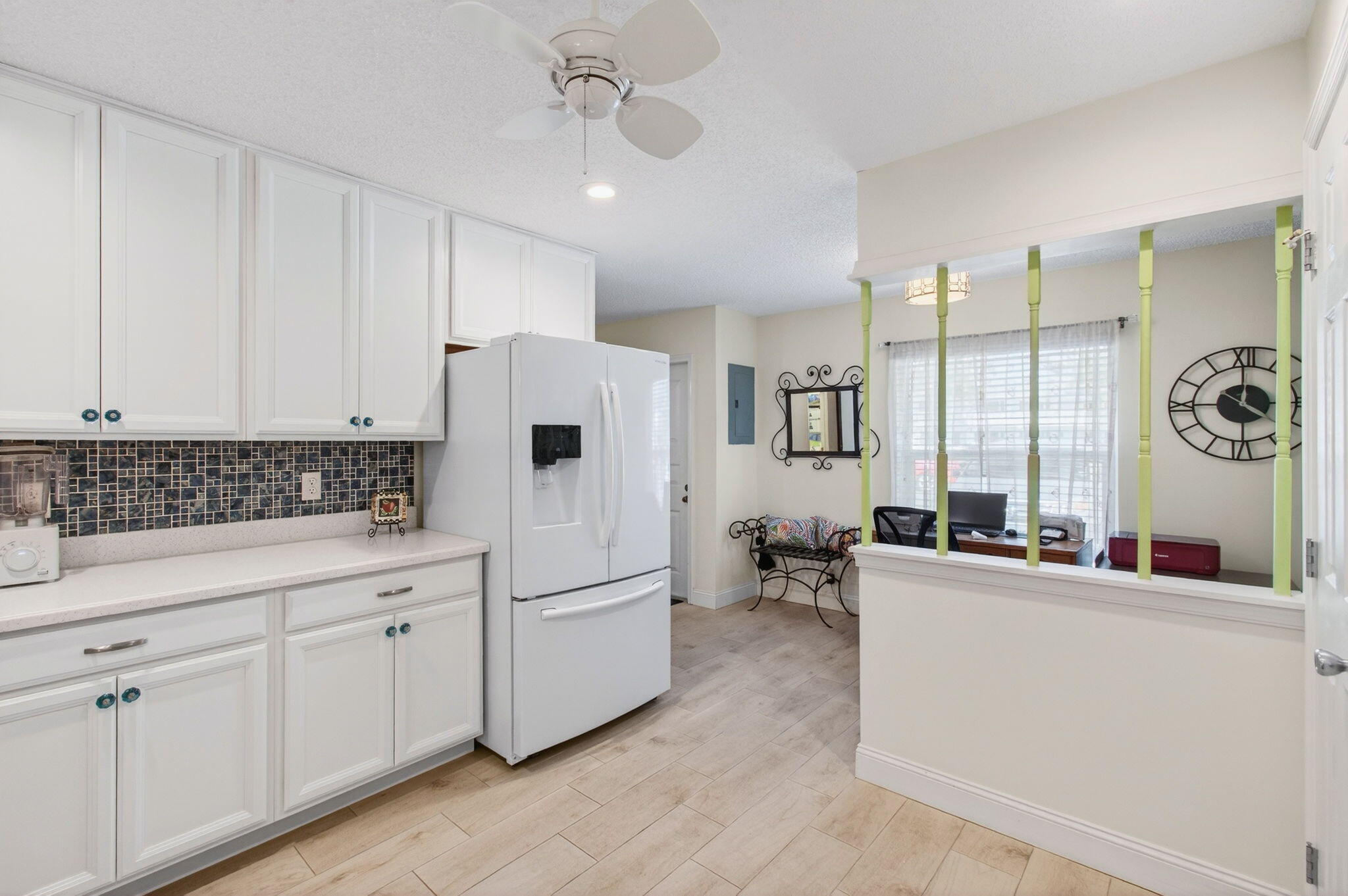 5452 Poppy Place, Unit D Delray Beach, FL 33484 - Photo 12 of 62 Open concept kitchen and mini desk area