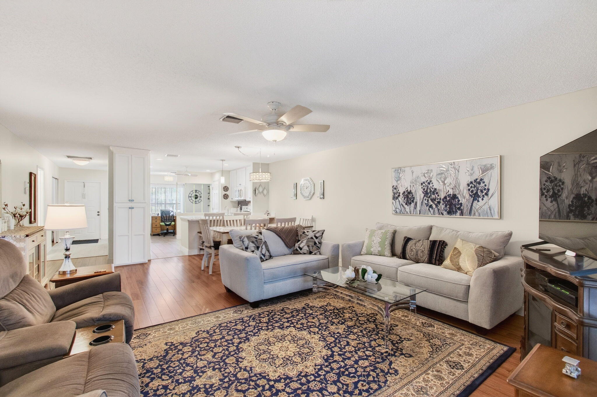 5452 Poppy Place, Unit D Delray Beach, FL 33484 - Photo 16 of 62 a living room with furniture and a rug