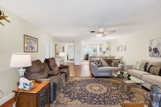 a bathroom with a toilet a sink and a mirror