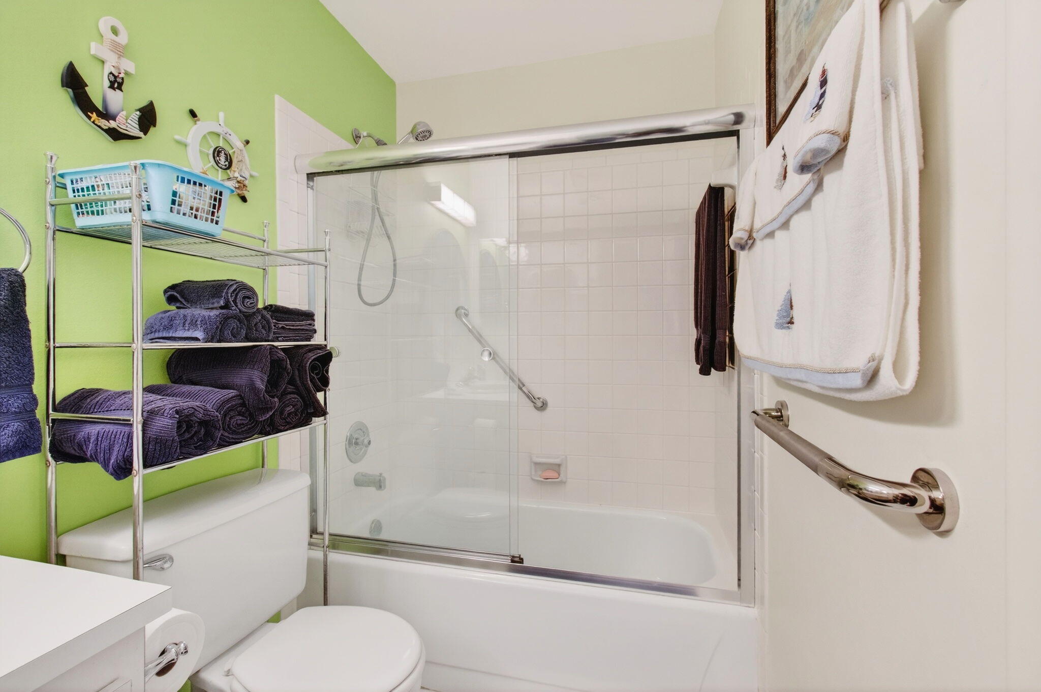 5452 Poppy Place, Unit D Delray Beach, FL 33484 - Photo 28 of 62 a bathroom with a shower and a toilet