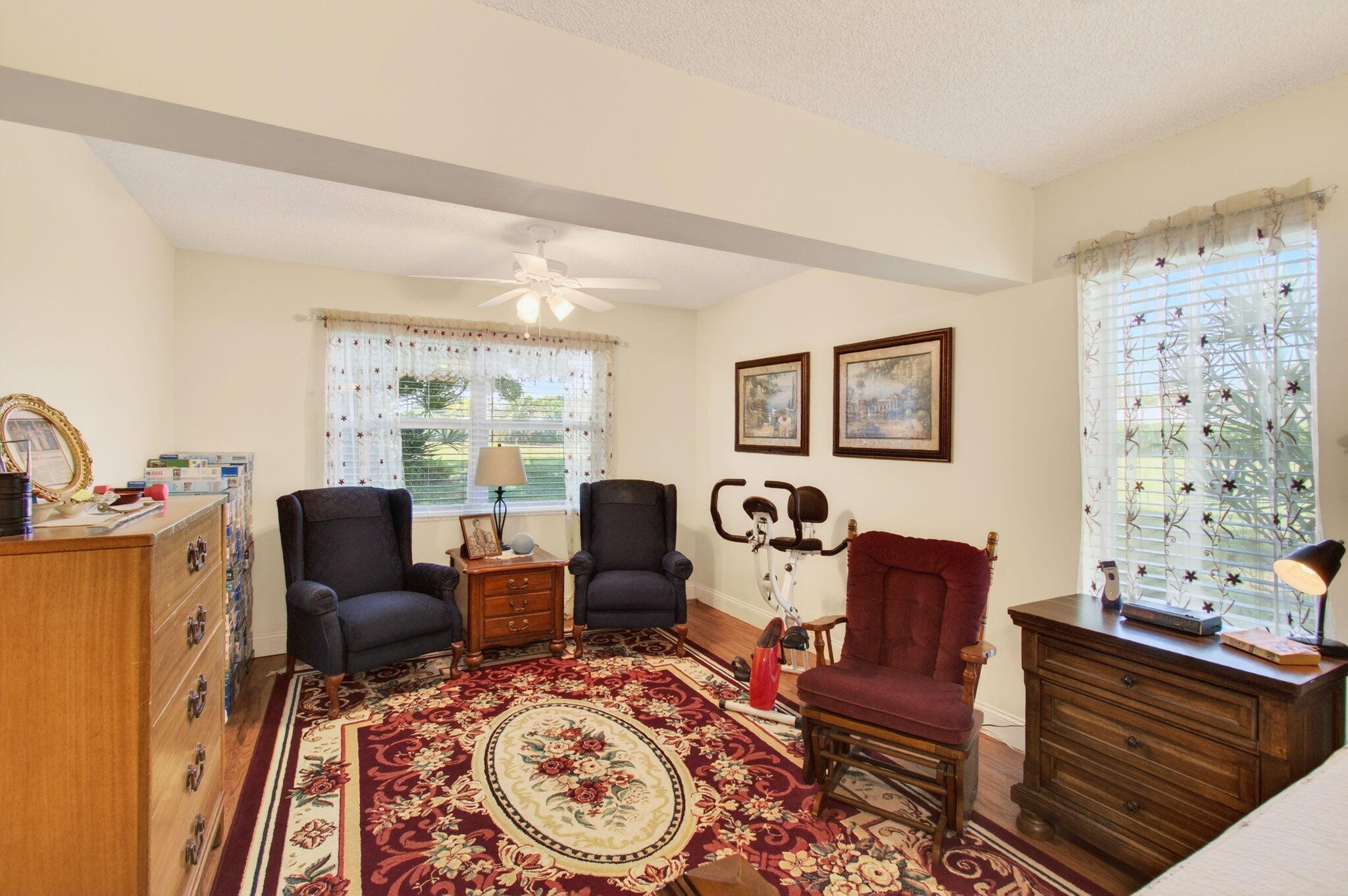 5452 Poppy Place, Unit D Delray Beach, FL 33484 - Photo 41 of 62 a living room with furniture and a large window