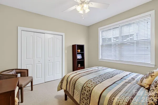 a view of a livingroom with furniture and window