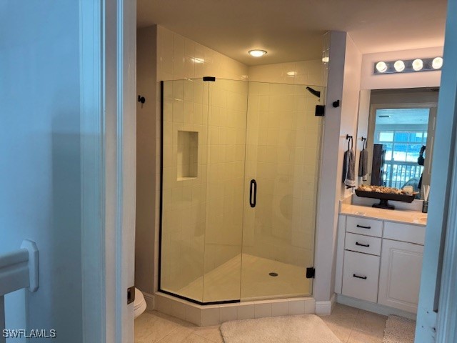 2743 First Street, Unit 105 Fort Myers, FL 33916 - Photo 20 of 29 a bathroom with a shower a mirror and a sink