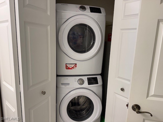 2743 First Street, Unit 105 Fort Myers, FL 33916 - Photo 21 of 29 a utility room with dryer and washer