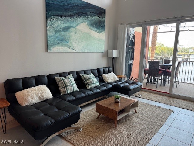 2743 First Street, Unit 105 Fort Myers, FL 33916 - Photo 7 of 29 a living room with furniture and a rug