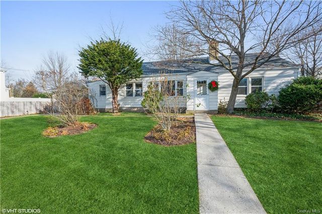 a front view of house with yard