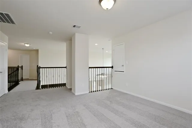 a view of a livingroom with a staircase