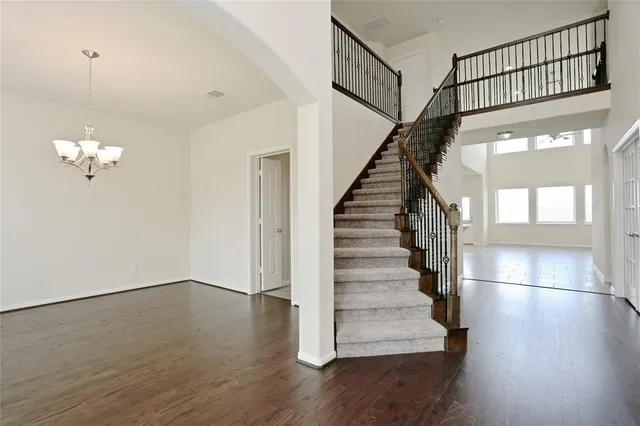 a view of entryway with wooden floor
