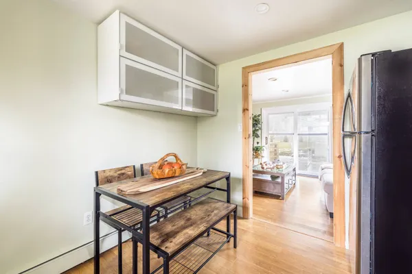 a reading room with furniture and a window