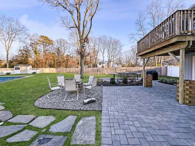 a view of a park with sitting area