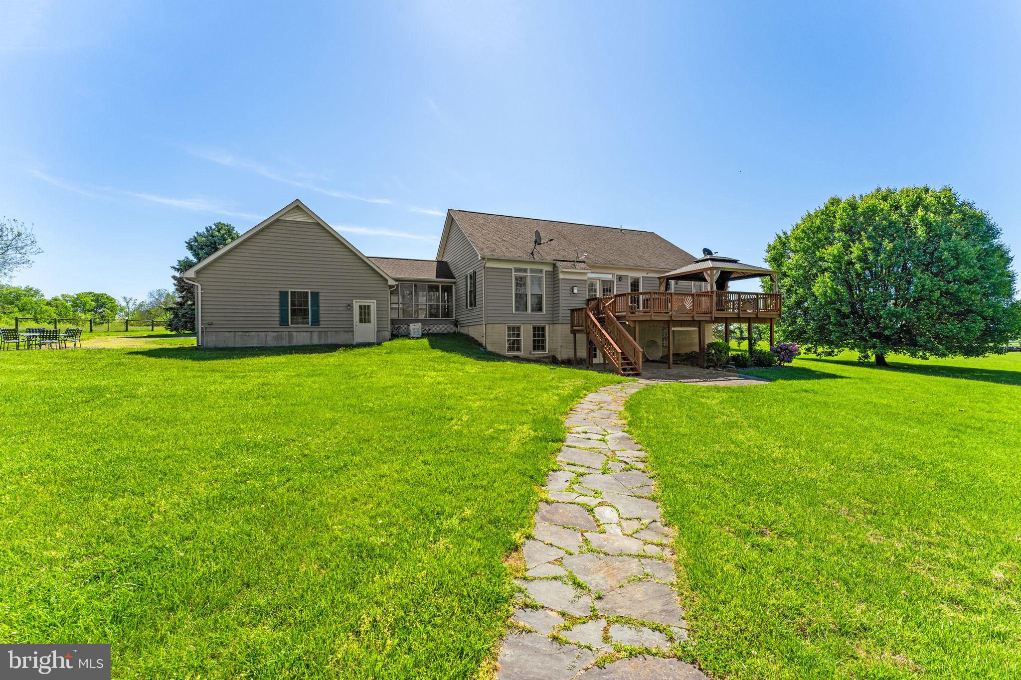 35130 Paxson Road Round Hill, VA 20141 - Photo 47 of 56 Stone walkway to the koi pond and garden