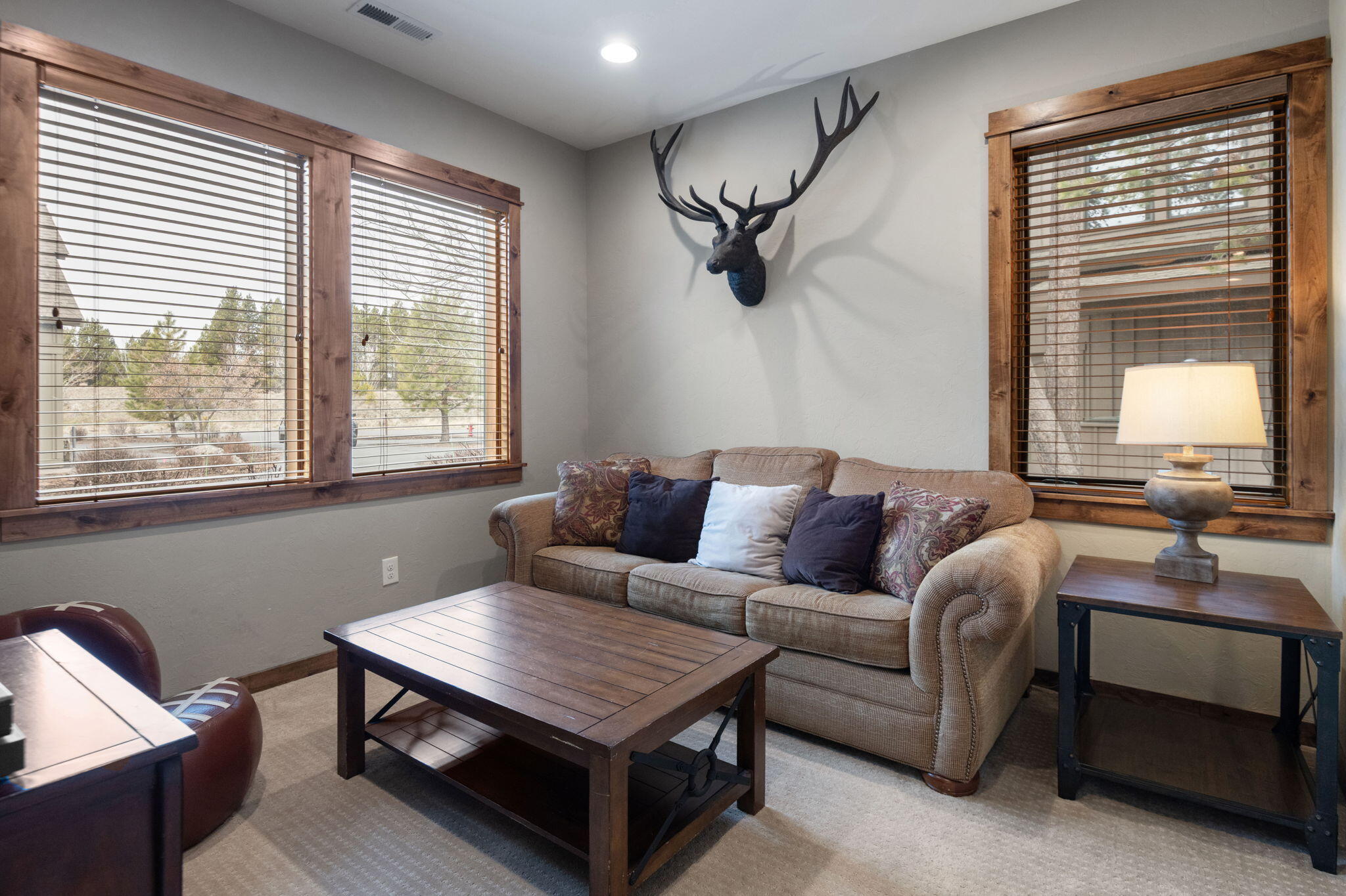 56508 Dancing Rock Loop, Unit 22 Bend, OR 97707 - Photo 10 of 69 a living room with furniture and a window