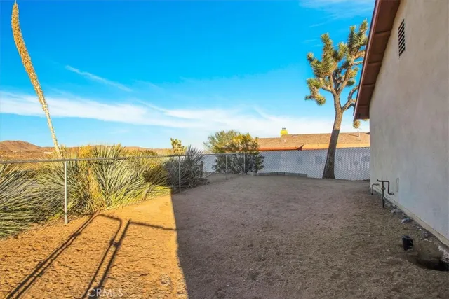a view of beach and patio