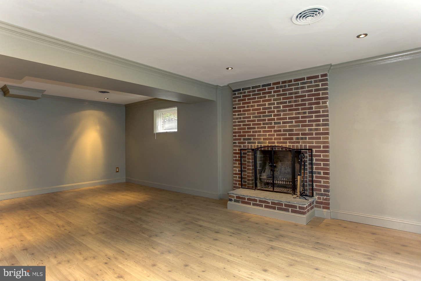10710 Lombardy Road Silver Spring, MD 20901 - Photo 16 of 24 Family Room with Wood-Burning FP