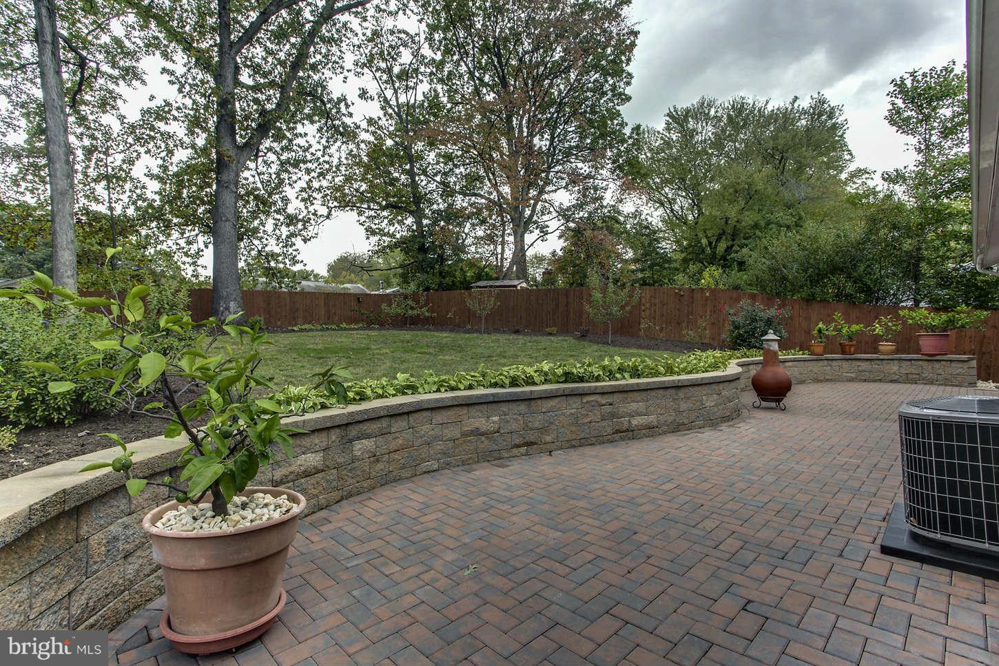 10710 Lombardy Road Silver Spring, MD 20901 - Photo 22 of 24 Courtyard Patio with Seat Wall