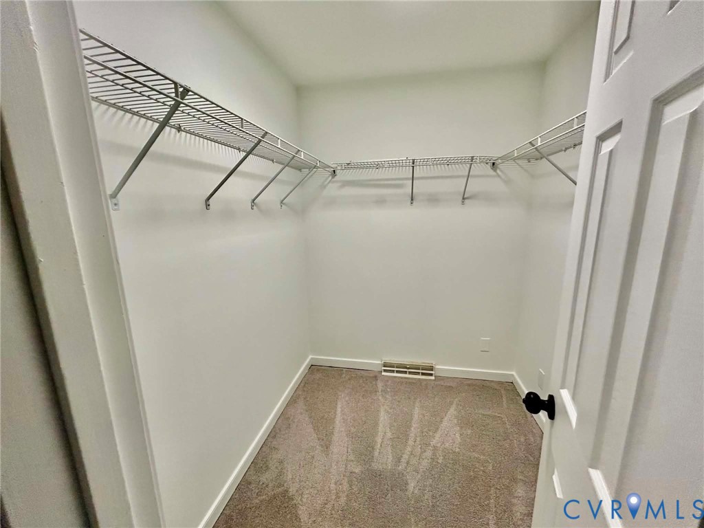 7110 Manning Road Chesterfield, VA 23832 - Photo 33 of 50 Walk-in closet with carpet flooring and wire shelv