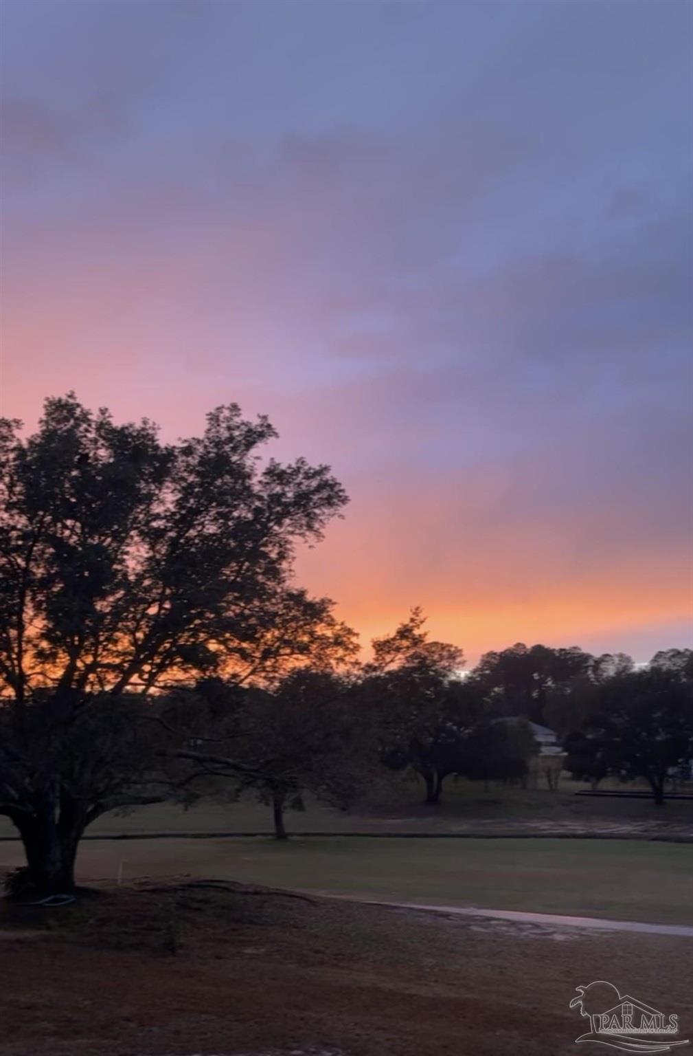 5708 Tamarack Drive Pace, FL 32571 - Photo 4 of 29 a view of house with mountain view
