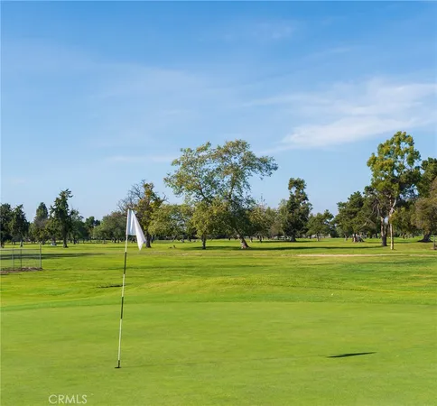a view of a big yard with an outdoor space and seating