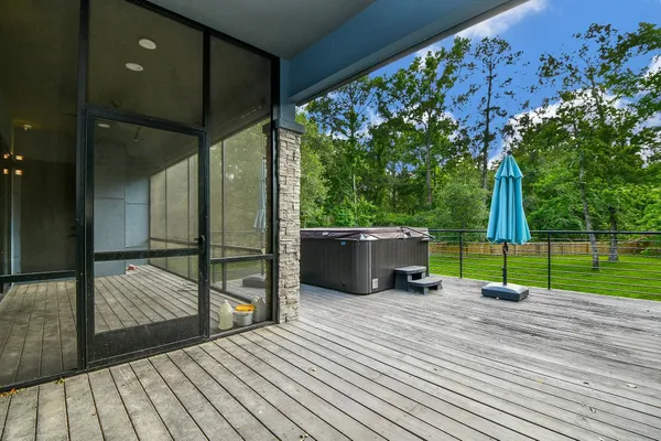 a view of a deck with a backyard