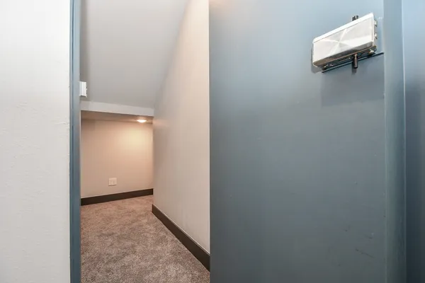 a view of a room with window and stairs