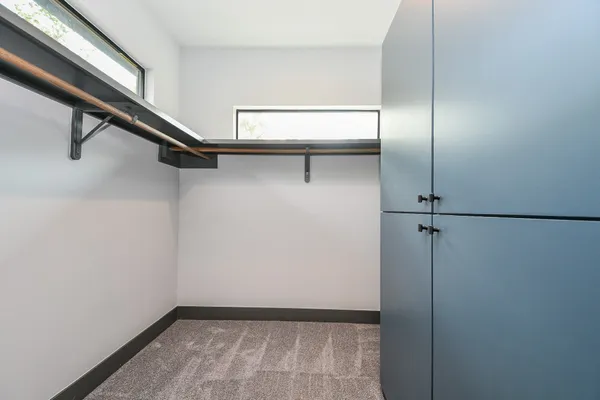 a view of a room with rack on the wall