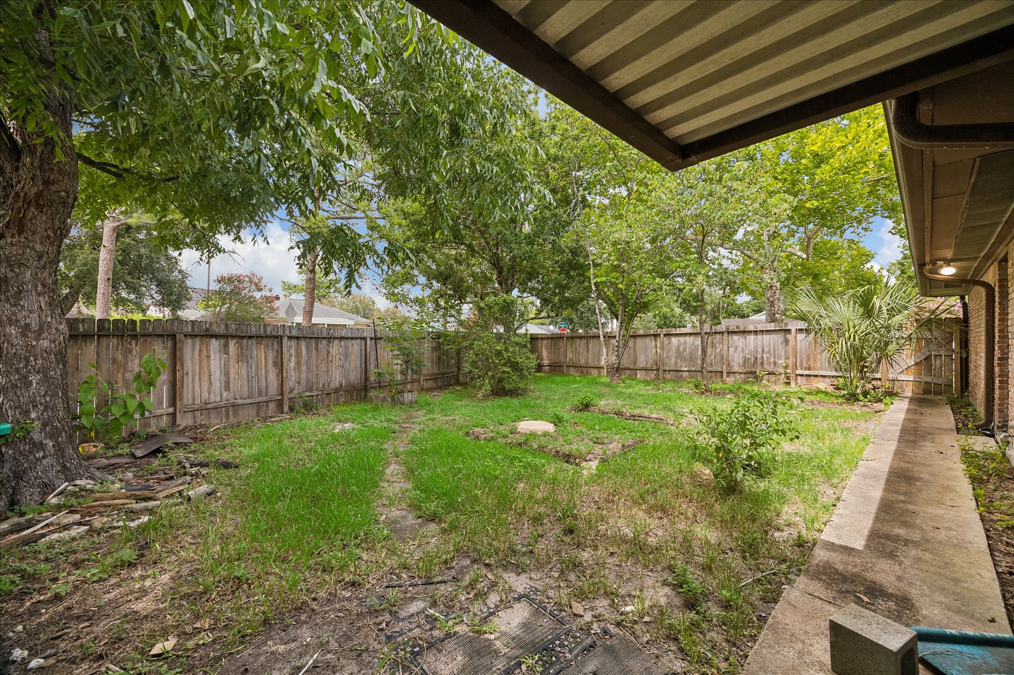 3314 Tanglewilde Street Houston, TX 77063 - Photo 10 of 23 Secondary Side yard fully fenced without a pool.