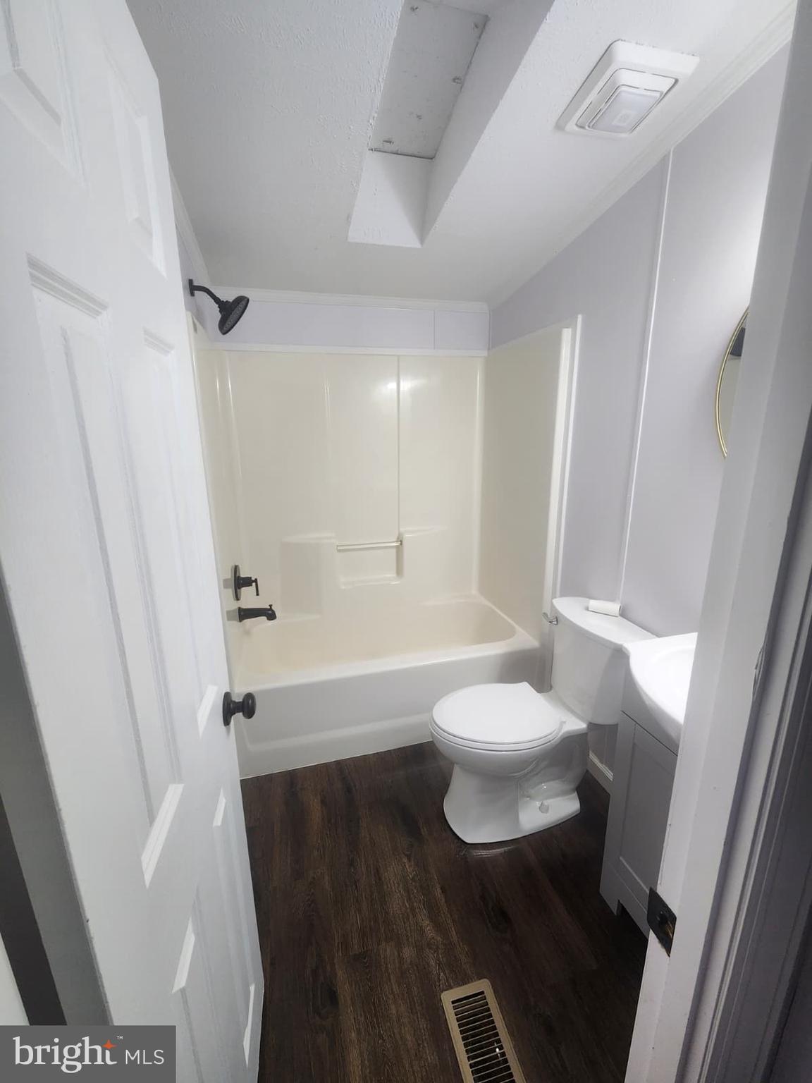2110 Mays Landing Road, Unit 199 Millville, NJ 08332 - Photo 12 of 18 a bathroom with a sink and a mirror