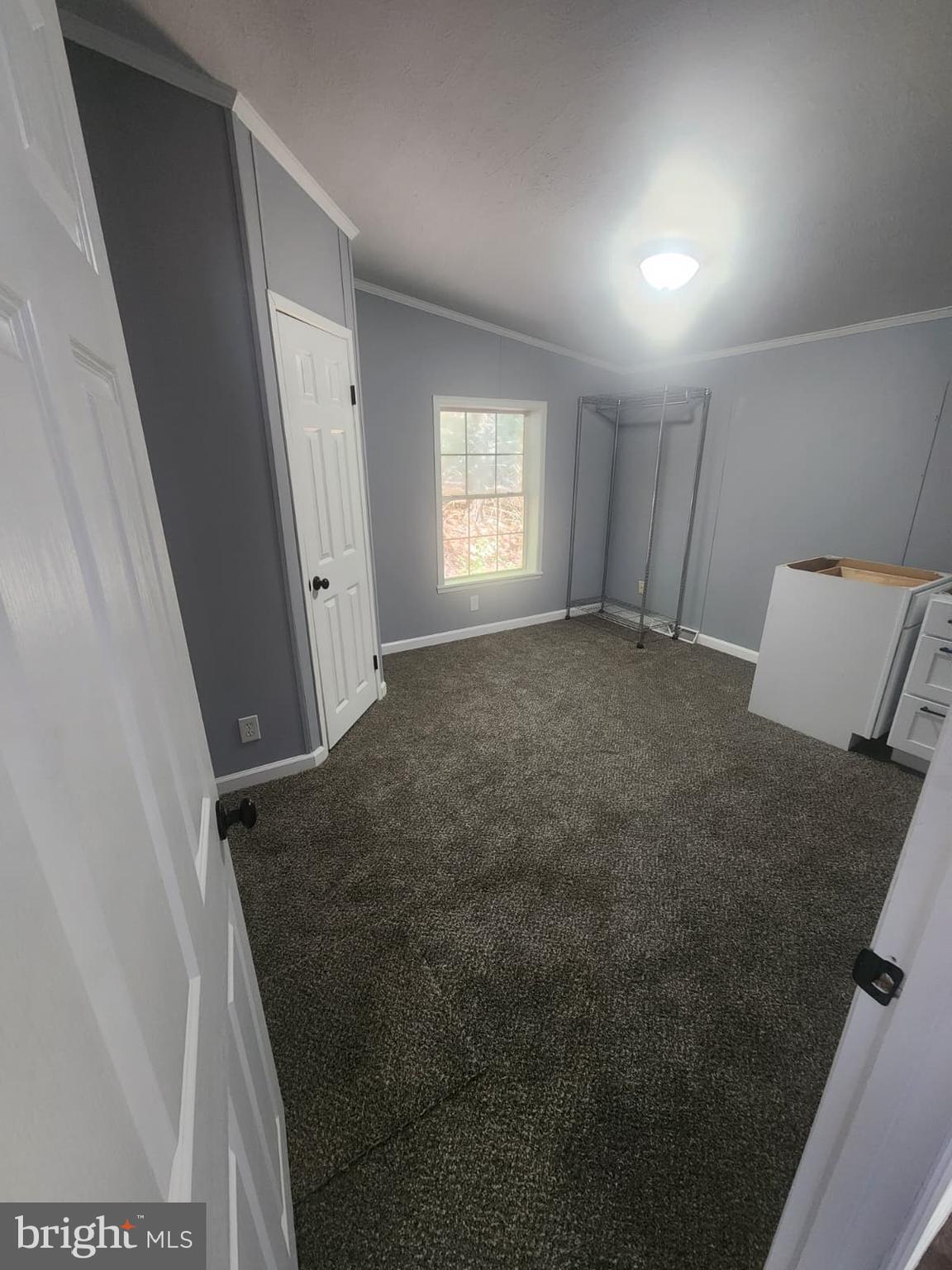 2110 Mays Landing Road, Unit 199 Millville, NJ 08332 - Photo 13 of 18 an empty room with windows