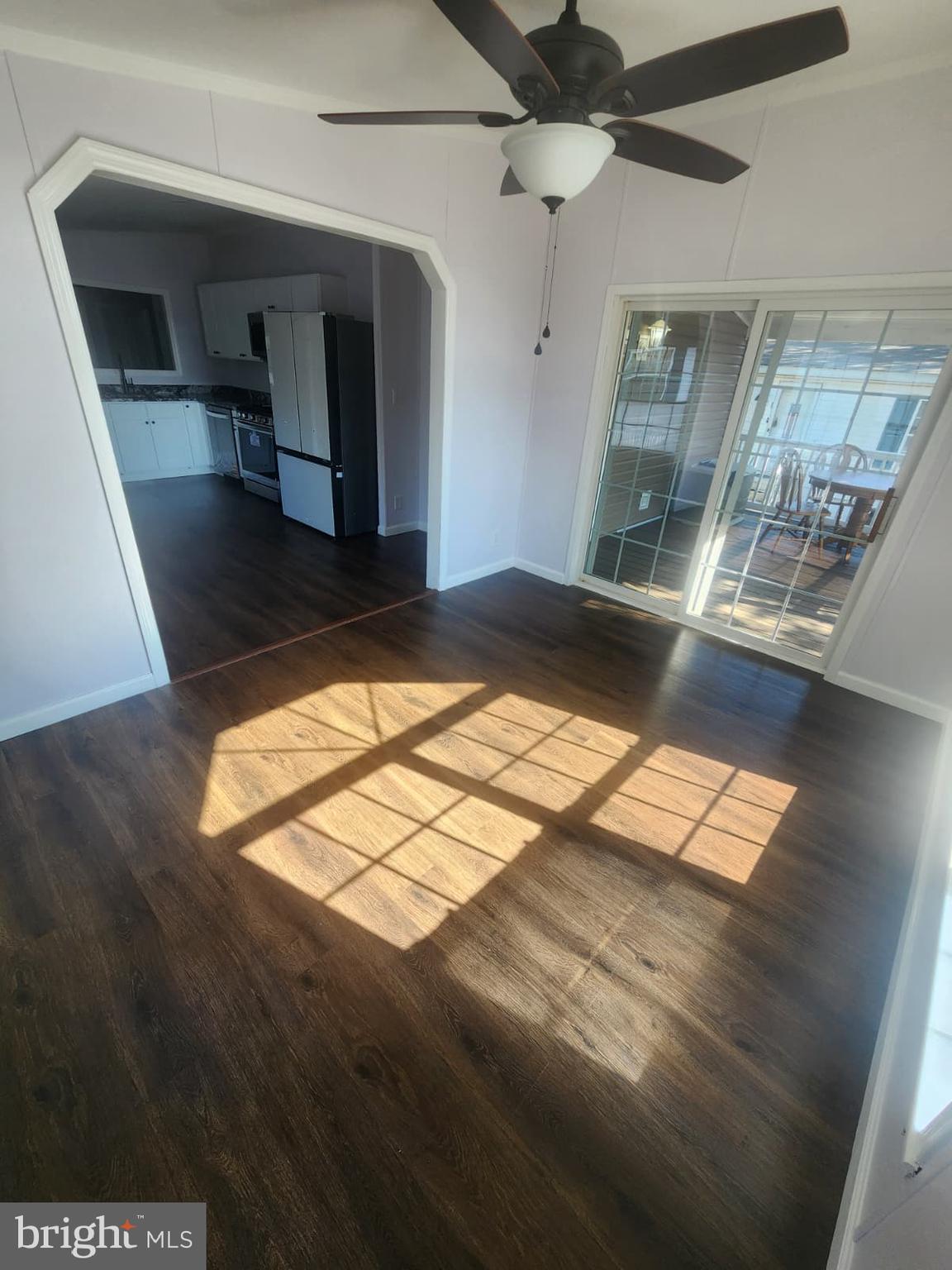 2110 Mays Landing Road, Unit 199 Millville, NJ 08332 - Photo 7 of 18 a view of wooden floor and windows in a room