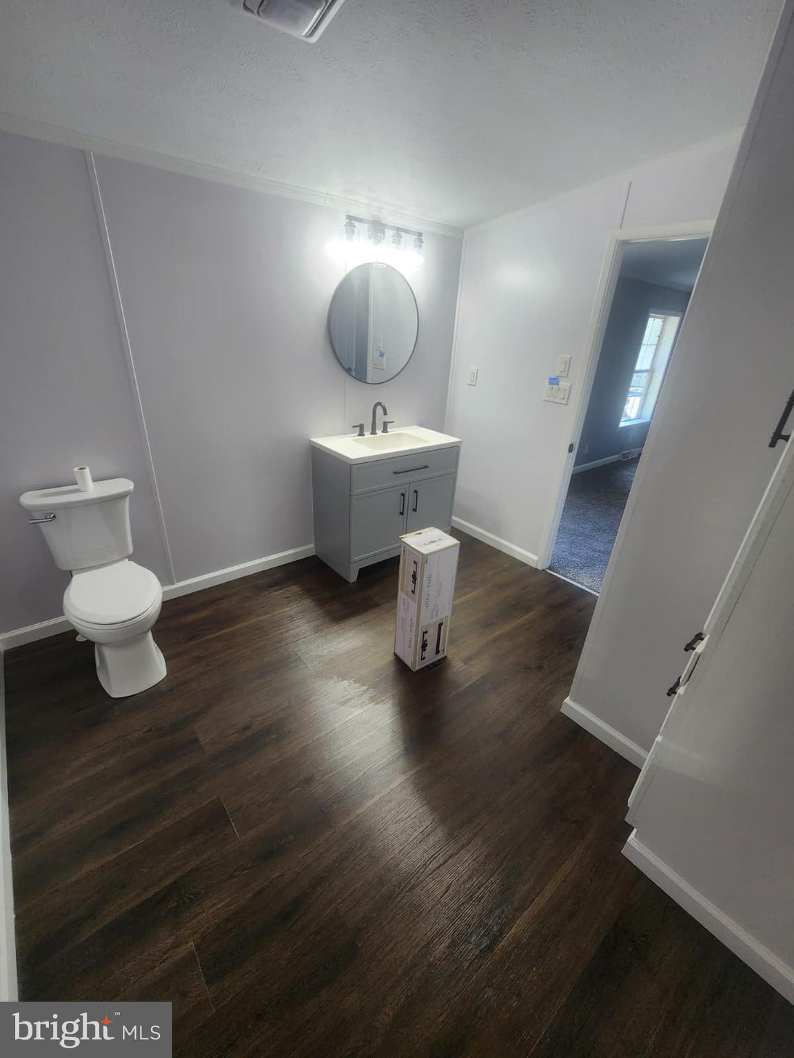 2110 Mays Landing Road, Unit 199 Millville, NJ 08332 - Photo 9 of 18 a bathroom with a sink and a mirror