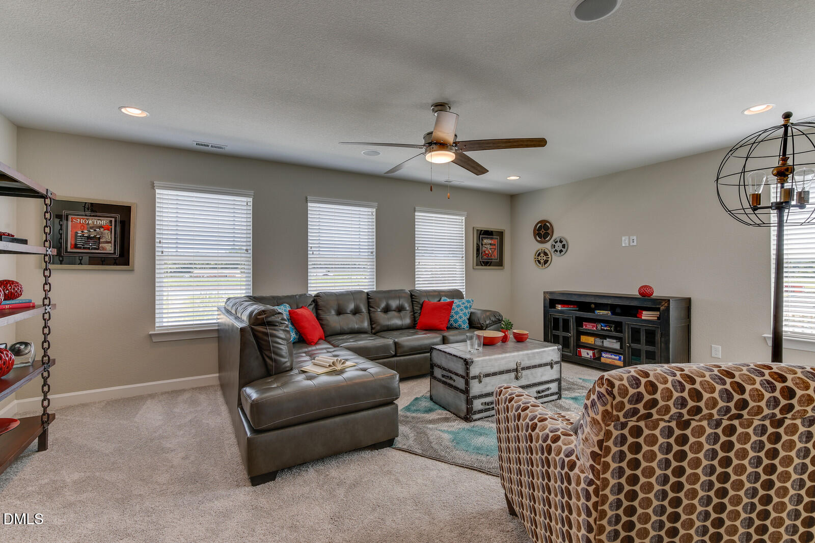 116 Brooklynn Trail Angier, NC 27501 - Photo 15 of 28 a living room with furniture and a flat screen tv