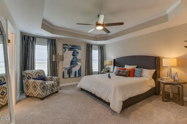 a bed room with a bed and a window