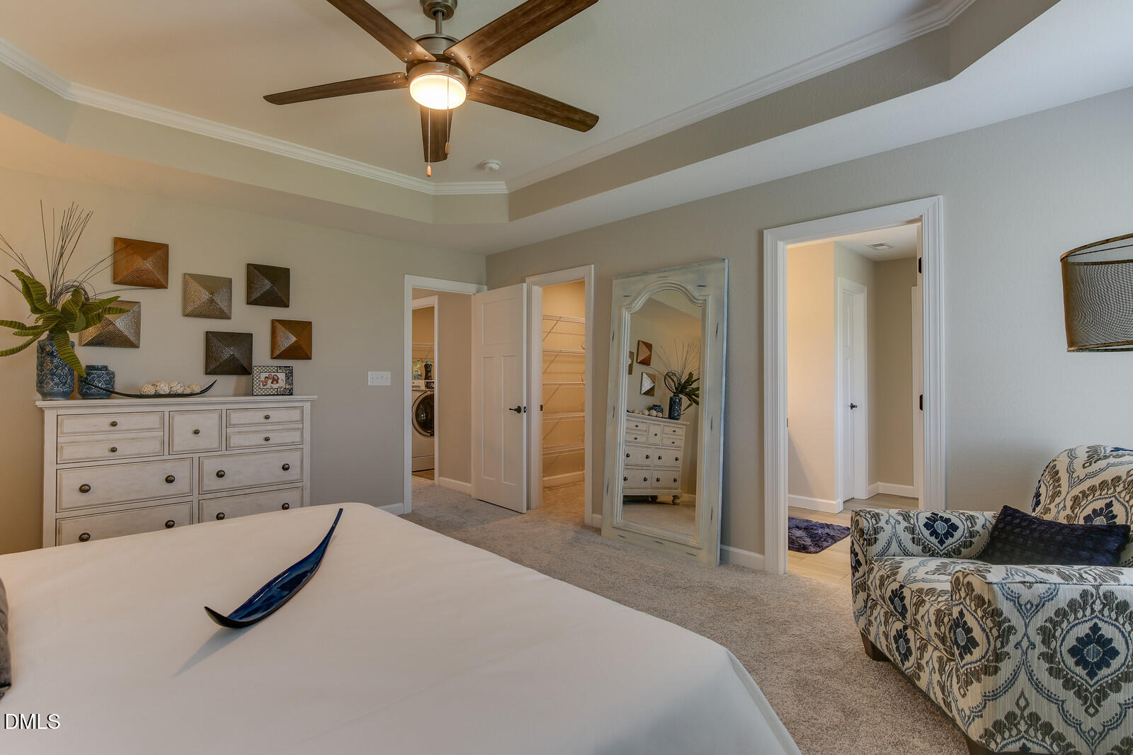 116 Brooklynn Trail Angier, NC 27501 - Photo 20 of 28 a bedroom with a bed and a chandelier