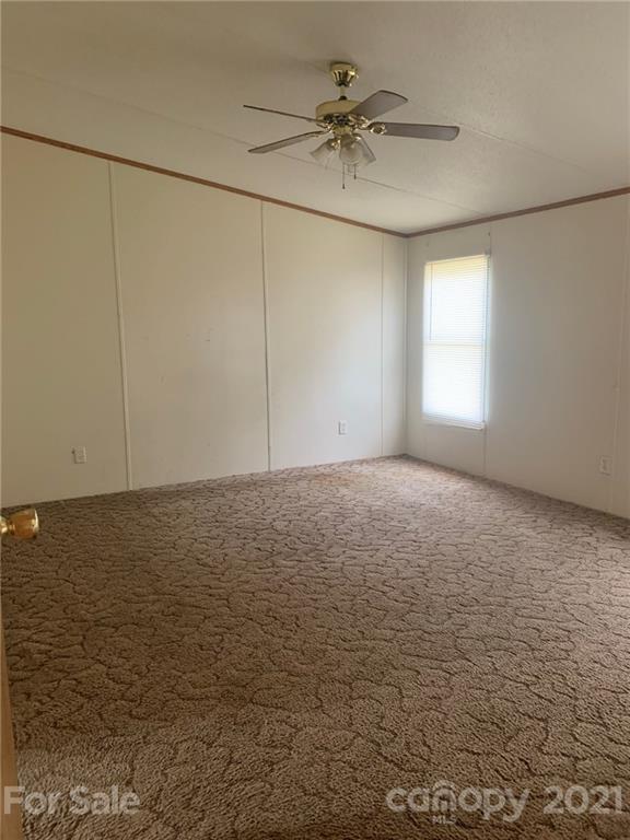 4524 Cherrystone Road Lancaster, SC 29720 - Photo 14 of 25 a view of an empty room and window