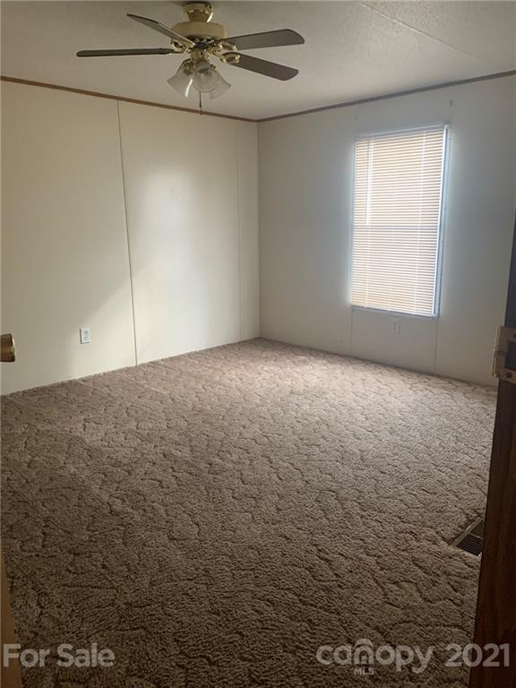 4524 Cherrystone Road Lancaster, SC 29720 - Photo 15 of 25 a view of an empty room with a window