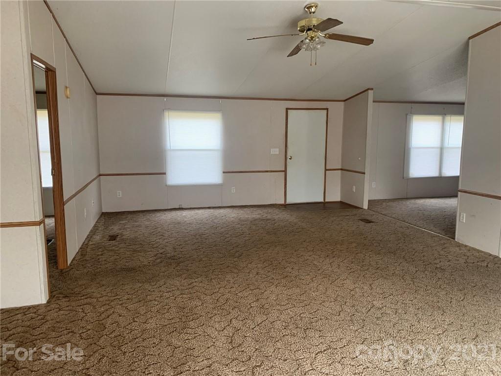 4524 Cherrystone Road Lancaster, SC 29720 - Photo 5 of 25 a view of a livingroom with a staircase