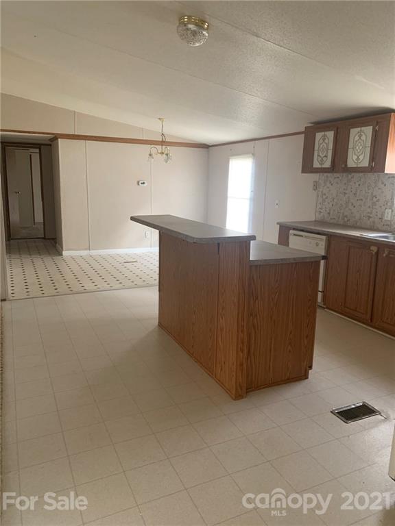 4524 Cherrystone Road Lancaster, SC 29720 - Photo 7 of 25 a view of kitchen with furniture and cabinet