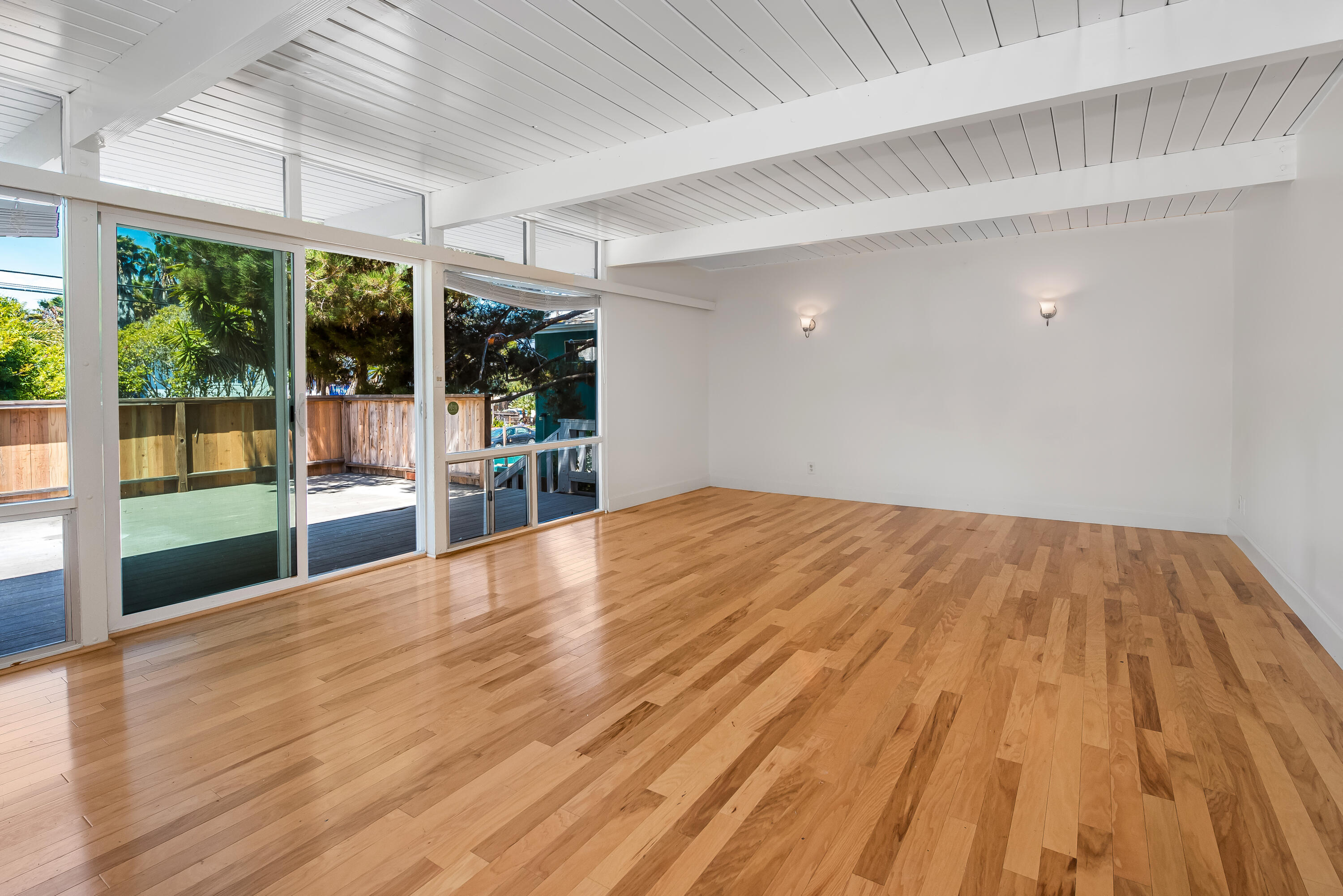 6711 Sabado Tarde Road Goleta, CA 93117 - Photo 7 of 9 a view of empty room with wooden floor and fan