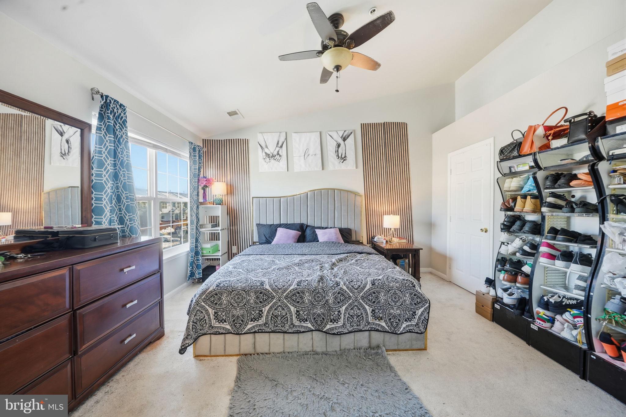 15420 Kennett Square Way Brandywine, MD 20613 - Photo 15 of 32 a bedroom with a bed and a window