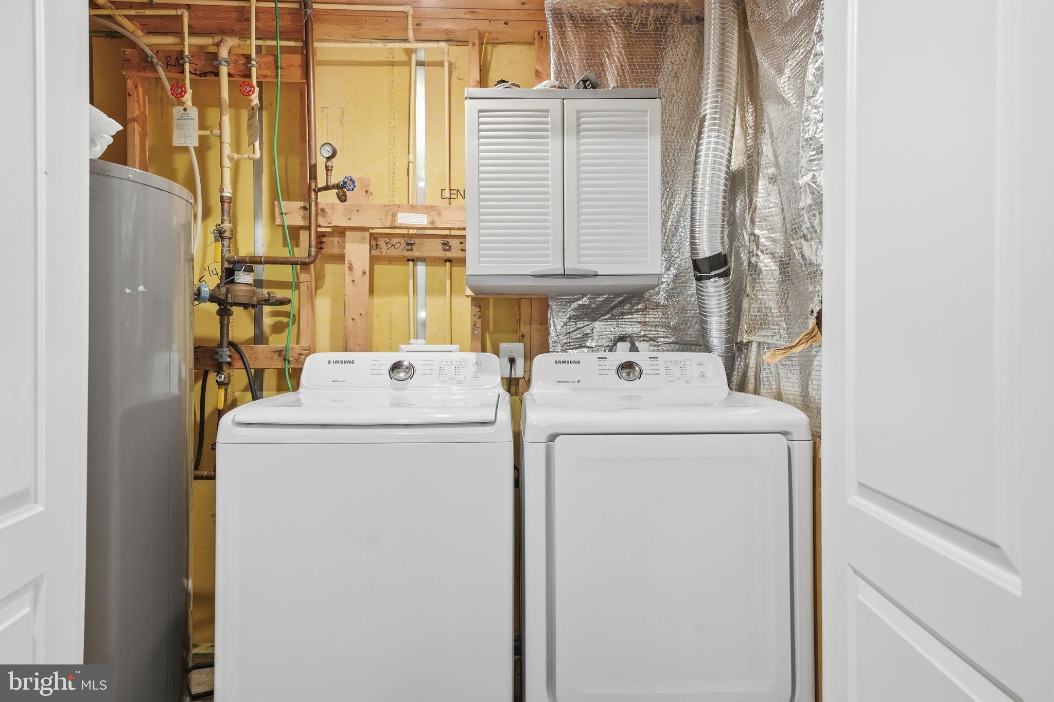 15420 Kennett Square Way Brandywine, MD 20613 - Photo 28 of 32 a utility room with dryer and washer